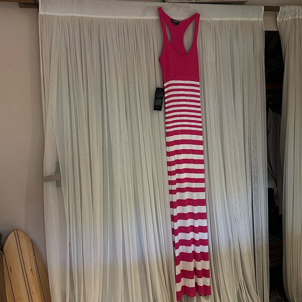 Body con dress by bebe. Great flattering fit. Racer back. Lined
